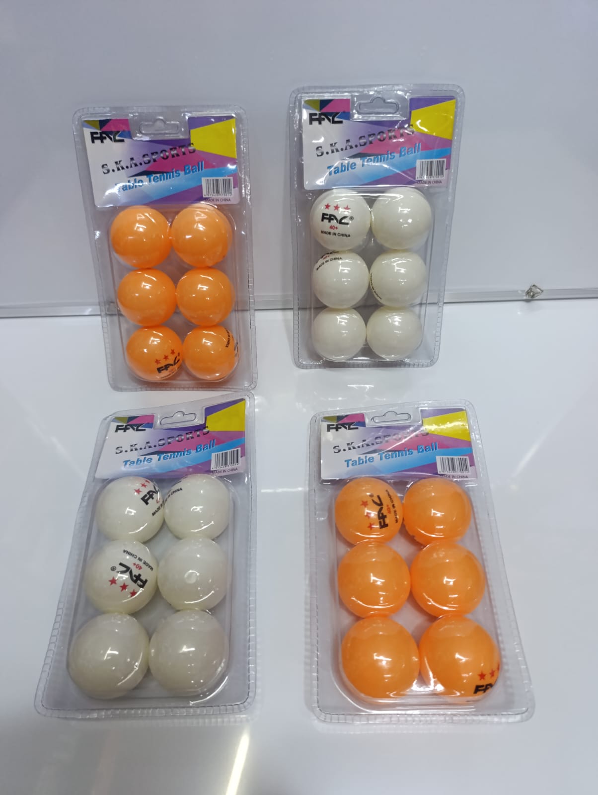 6-Pack Table Tennis Balls – White & Orange Ping Pong Balls, Standard size and weight for recreational and professional play, Durable and lightweight for consistent bounce and performance.