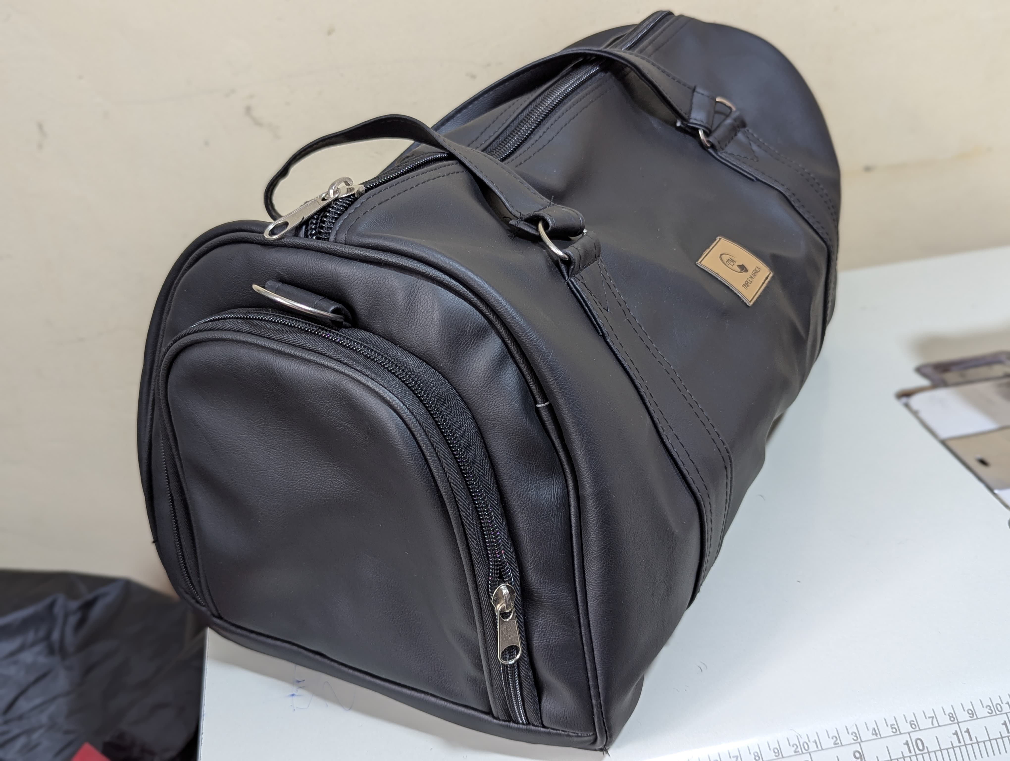 TRAVEL BAG ⚡Water proof leather travel bag with a shoe pocket special only for a pair of shoe⚡and a laptop compart pocket inside , Easy to carry either by hand or shoulder an also at backside😍😍