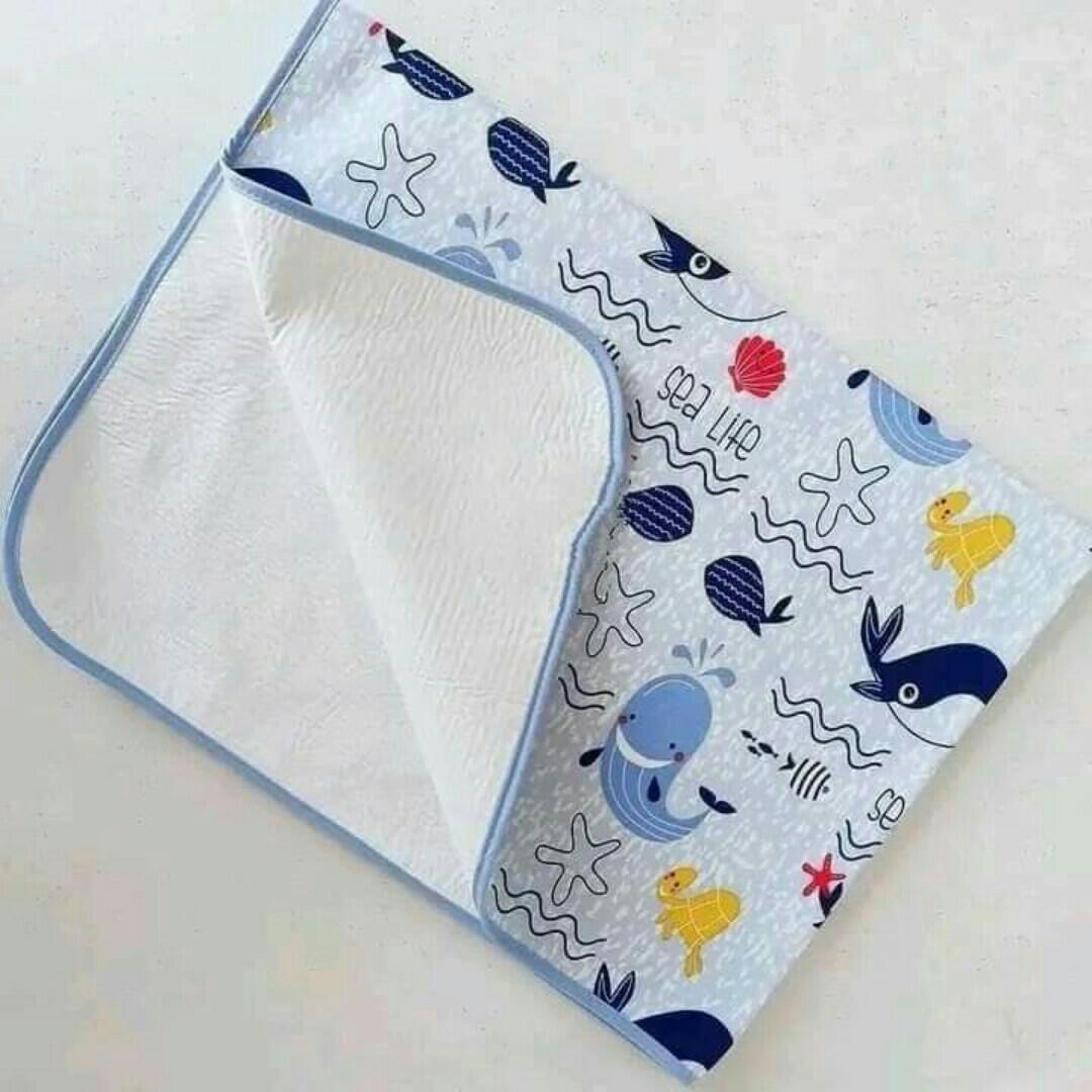 Changing Mat/Baby Mackintosh