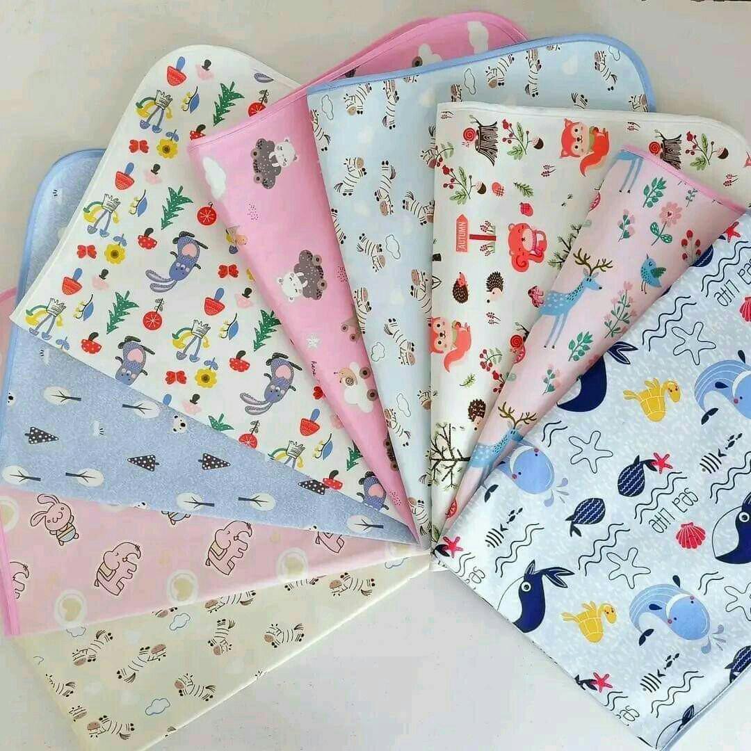 Changing Mat/Baby Mackintosh