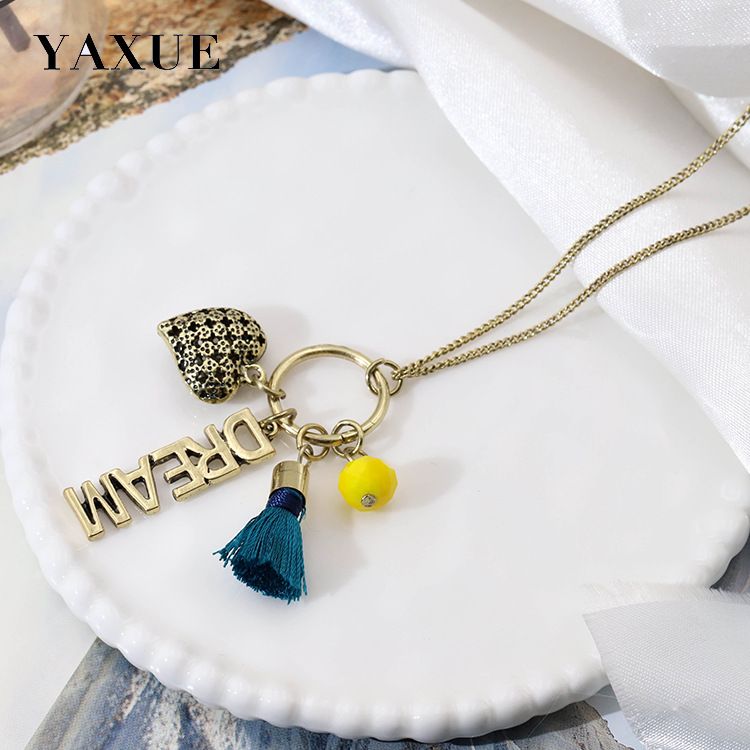 Retro English letter heart-shaped pendant long tassel necklace item simple transparent bead glass imitation pearl handmade versatile classic necklace