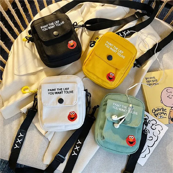 Korean version of ins canvas crossbody bag female bag new 2024 network red with the same student small fresh hand shoulder bag