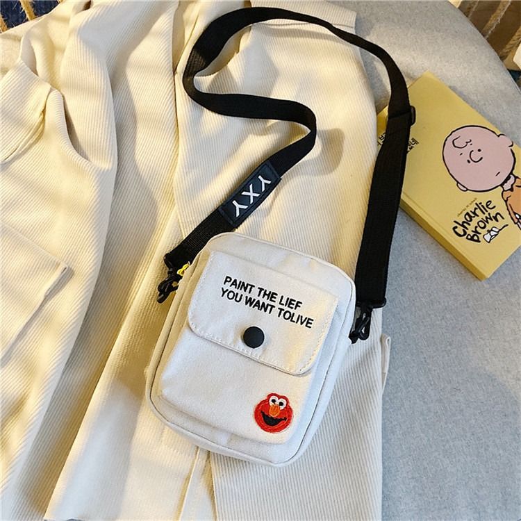 Korean version of ins canvas crossbody bag female bag new 2024 network red with the same student small fresh hand shoulder bag