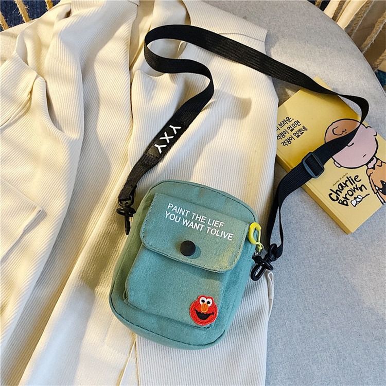 Korean version of ins canvas crossbody bag female bag new 2024 network red with the same student small fresh hand shoulder bag