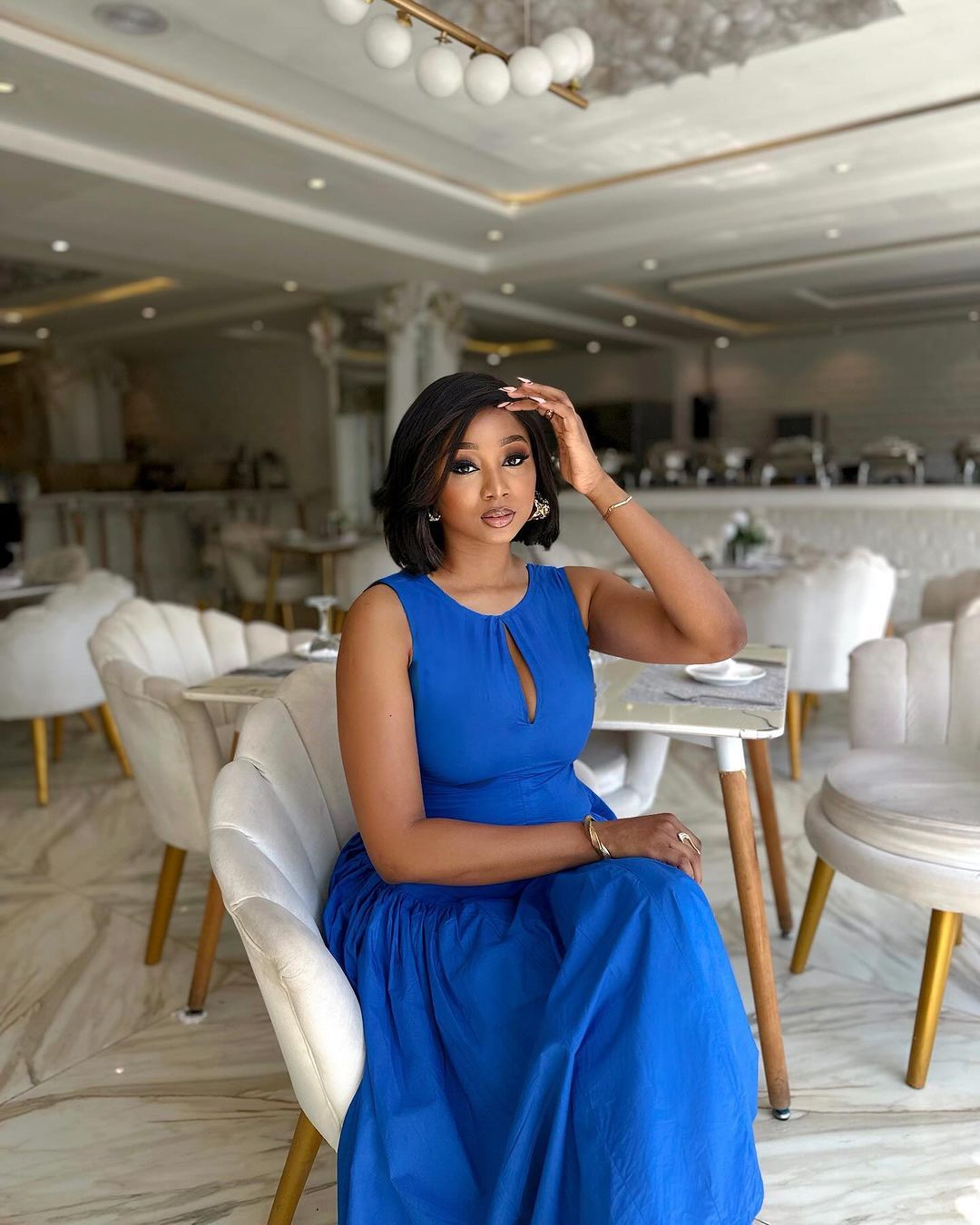 New product selection: European and American foreign trade women's clothing summer new fashion round neck hollow out mid length waist collection sleeveless vest dress