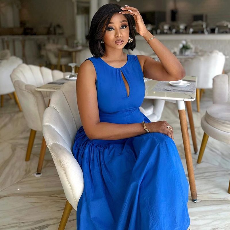 New product selection: European and American foreign trade women's clothing summer new fashion round neck hollow out mid length waist collection sleeveless vest dress