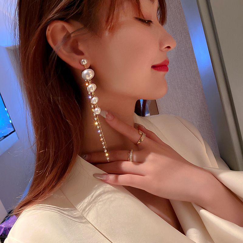 Diamond studded pearl tassel earrings, European and American personalized long earrings, fashionable temperament, trendy earrings