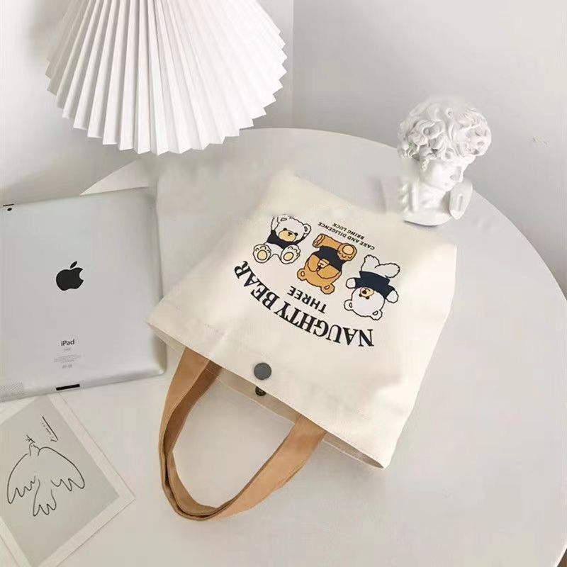 Canvas bag, small and versatile handbag, female student lunch box bag, simple hand-held bag, office worker bento bag