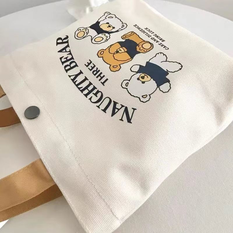 Canvas bag, small and versatile handbag, female student lunch box bag, simple hand-held bag, office worker bento bag