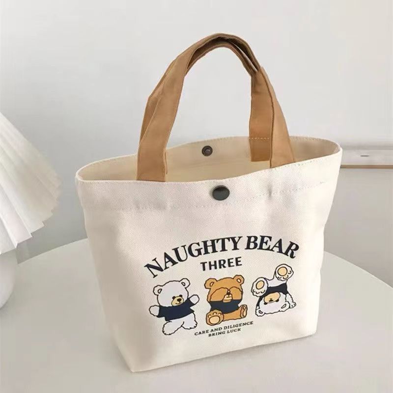 Canvas bag, small and versatile handbag, female student lunch box bag, simple hand-held bag, office worker bento bag