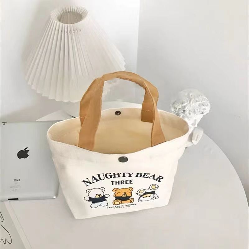 Canvas bag, small and versatile handbag, female student lunch box bag, simple hand-held bag, office worker bento bag