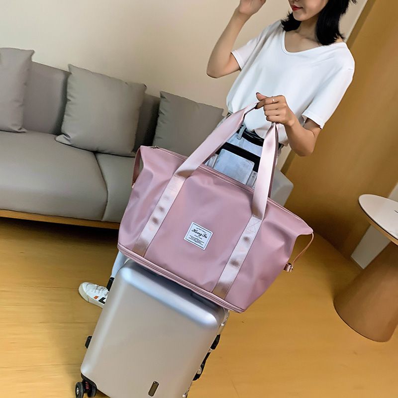 Fashionable portable travel bag, travel bag, large capacity storage bag, shoulder bag