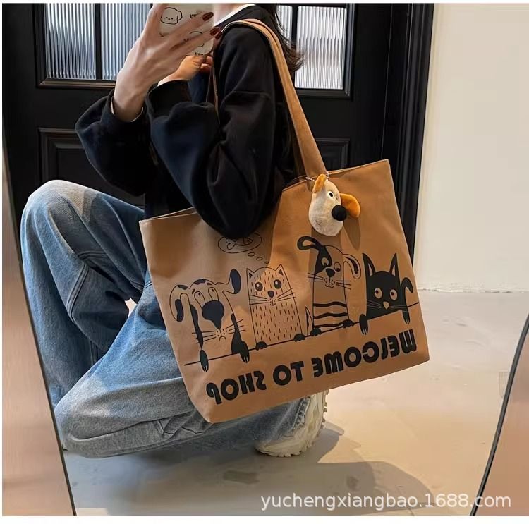 Leisure large capacity canvas bag for women 2025 new lightweight and versatile commuting shoulder bag graffiti tote bag