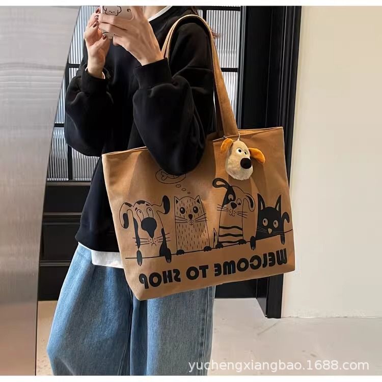 Leisure large capacity canvas bag for women 2025 new lightweight and versatile commuting shoulder bag graffiti tote bag