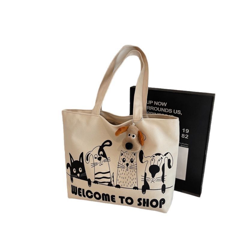 Leisure large capacity canvas bag for women 2025 new lightweight and versatile commuting shoulder bag graffiti tote bag