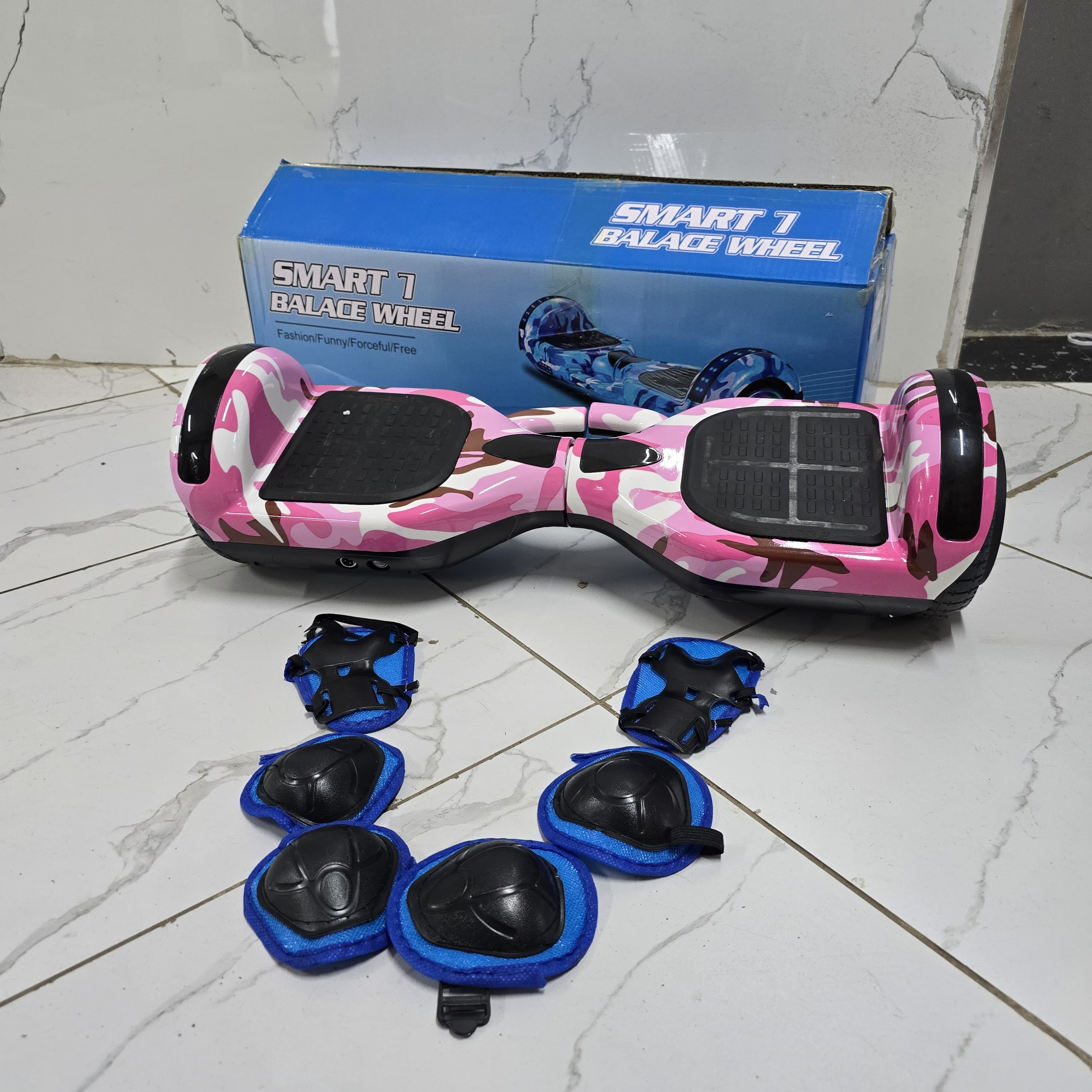 1pc Quality Smart 7 hoverboards 
With Bluetooth connection
Has protective gears, i.e., guards
Comes with adapter charger