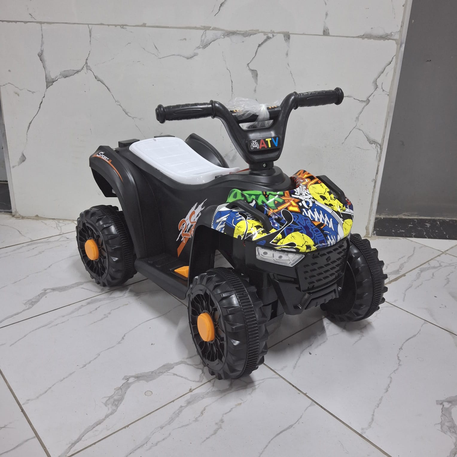 Kids Mini quad bike 
Uses rechargeable battery
Comes with adapter charger
Ages 2-4.5yrs