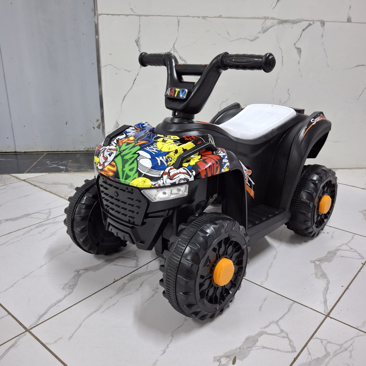 Kids Mini quad bike 
Uses rechargeable battery
Comes with adapter charger
Ages 2-4.5yrs