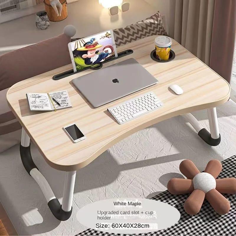 Breakfast laptop table/work table 🔆Material -MDF🔆Measurements  Width 40cms Length 60cms Height 28cms
🔆Comes fully assembled 
🔆Easy to store because the legs are foldable 
🔆 Colours: cream, bro