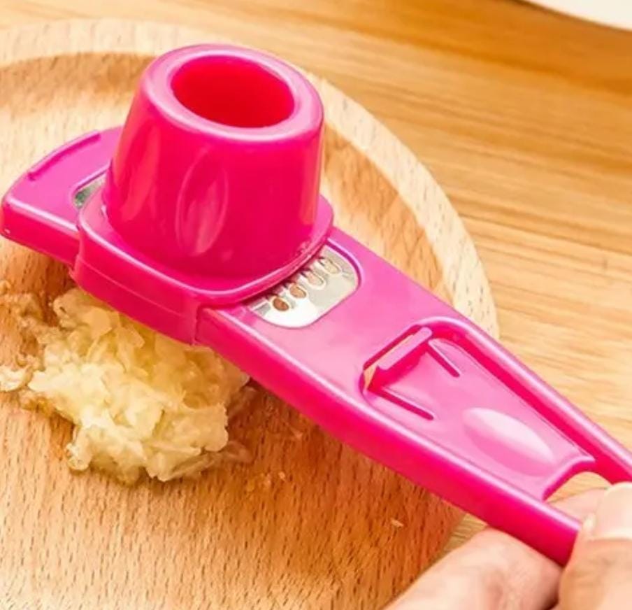 Garlic/ginger grater 🔆easy to use and
 healthy Colours available - pink and green 
Check video attached