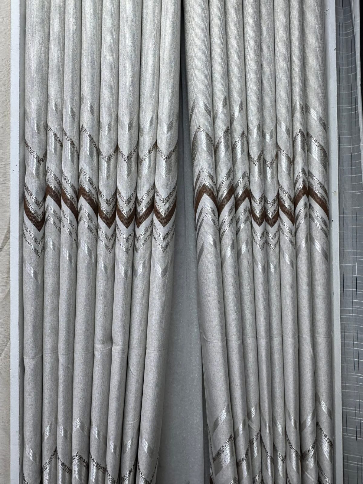 2Pcs Superb Quality Heavy Fabric Cream With Brown Patterns Curtains For Home Window and Door. They Come with Eyelet Header and a height of 2.25m
