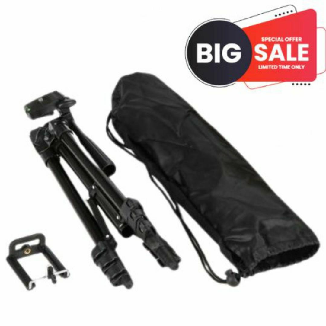 Tripod Stand For Camera & Phones With Phone Holder - 1.2 MetersTall Tripod. New design with wider flip leg locking system for fast setup and fold away. Comes with phone holder. Max operating height1,2