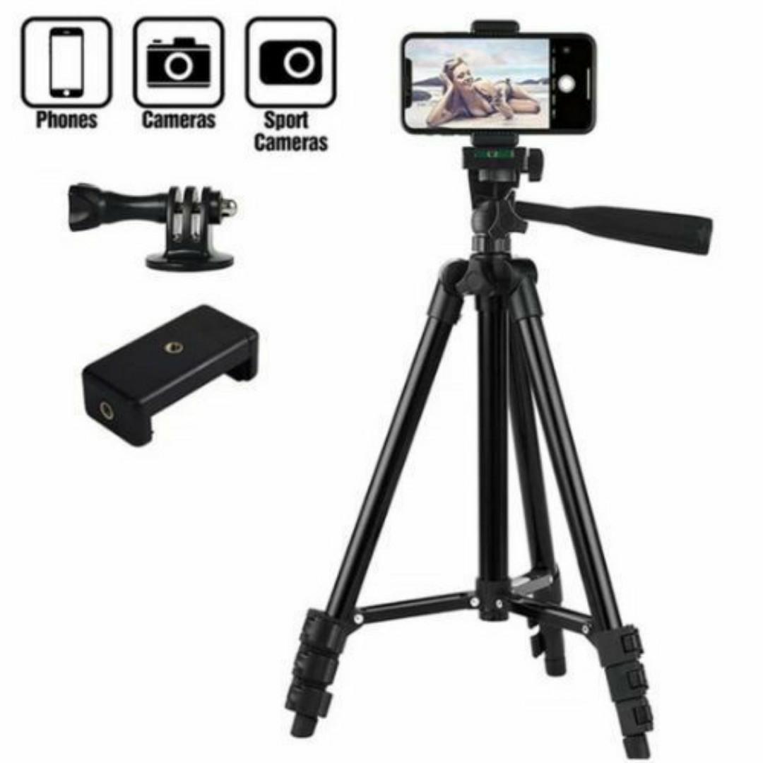 Tripod Stand For Camera & Phones With Phone Holder - 1.2 MetersTall Tripod. New design with wider flip leg locking system for fast setup and fold away. Comes with phone holder. Max operating height1,2