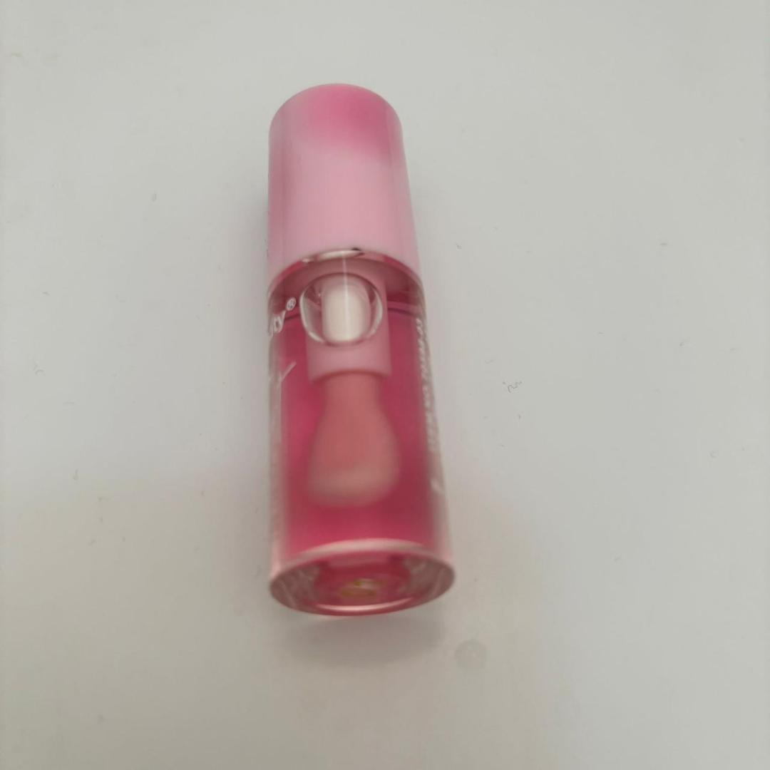 Kiss beauty lip oil. It hydrates your lips making them moist also removes hyperpigmentation making them pink