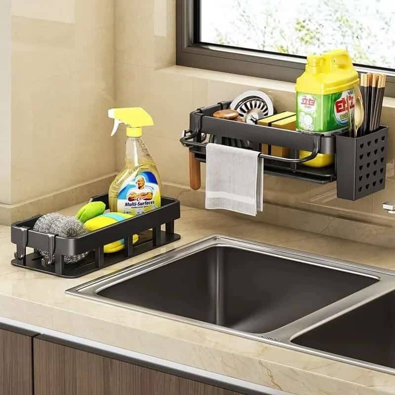 Kitchen/bathroom sink caddy with water draining tray, towel hook and cutlery holder available in black