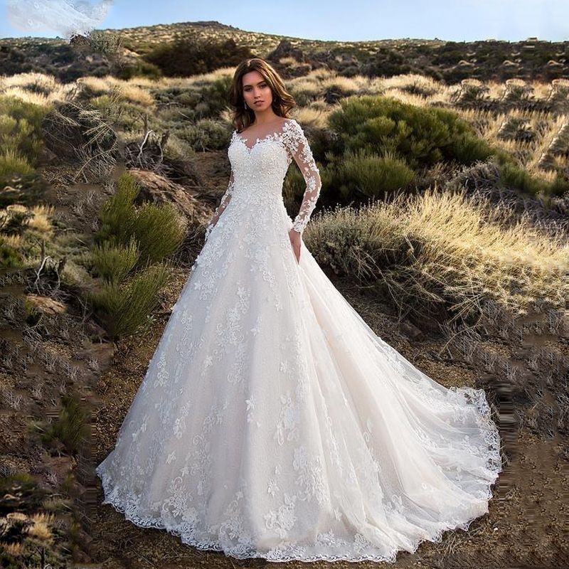 Elegant and beautiful European and American women's dress long sleeved solid color perspective lace bridal wedding dress