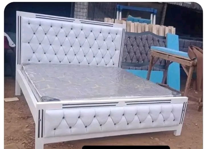 Mocket bed frame featuring a tufted upholstered headboard with NO MATTRESS