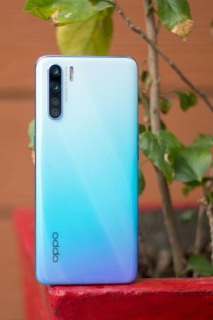 EX -UK Oppo F15  featuring a 6.4-inch AMOLED screen, MediaTek Helio P70 chip, 8GB RAM, 128GB storage, and 48MP quad-camera system with an in-display fingerprint sensor, known for its design
