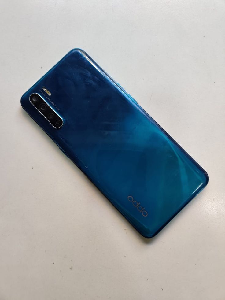 EX -UK Oppo F15  featuring a 6.4-inch AMOLED screen, MediaTek Helio P70 chip, 8GB RAM, 128GB storage, and 48MP quad-camera system with an in-display fingerprint sensor, known for its design