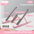 Laptop stand Hollow cooling bracket Desktop height iPad tablet base lift Folding portable shelf can be freely adjusted