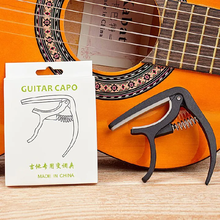 Premium Nylon Guitar Capo - Quick Change Clamp for Easy Tone Adjustment - Fits Acoustic, Classic, Electric Guitars and Ukuleles