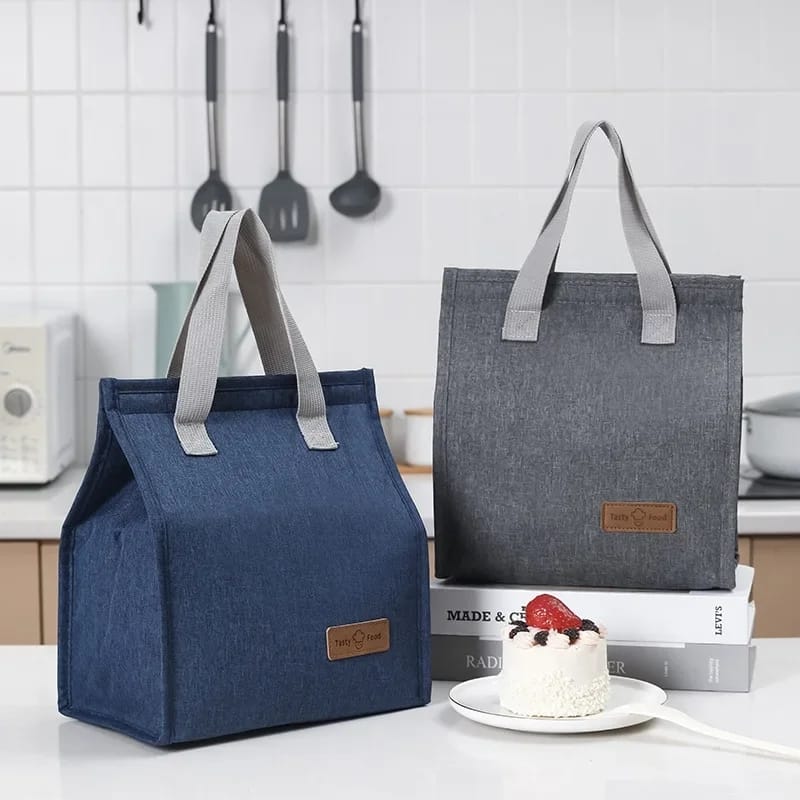 Insulated Tote Lunch Bag. Lightweight and portable designed which makes it perfect for packing lunch boxes, fruit, drinks, snacks, and more.