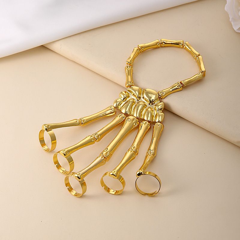 European and American new hand accessories, fashionable and personalized punk skull hand bones, versatile five-finger ring bracelet, adjustable integrated chain