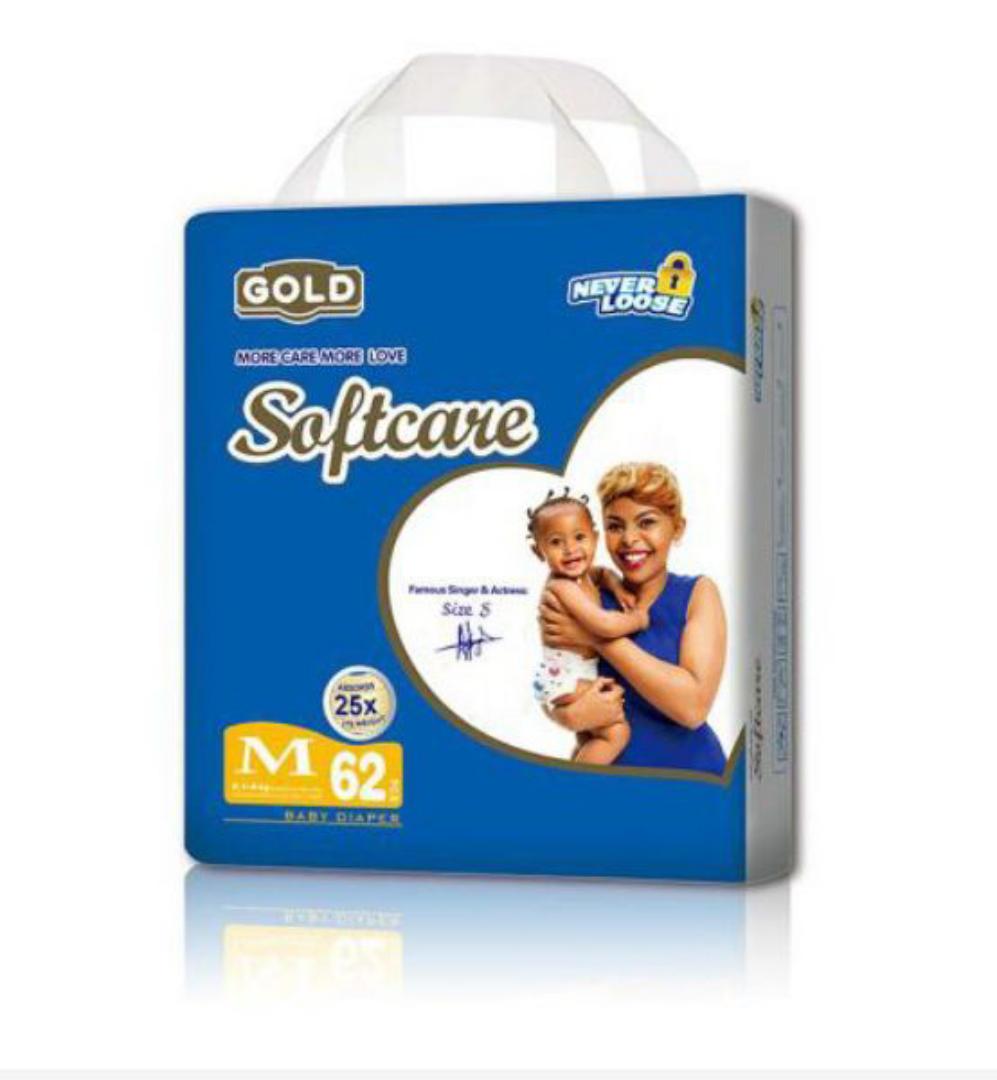Soft care midi 62 pieces diapers + 2 latest fashion baby siuts  different colours