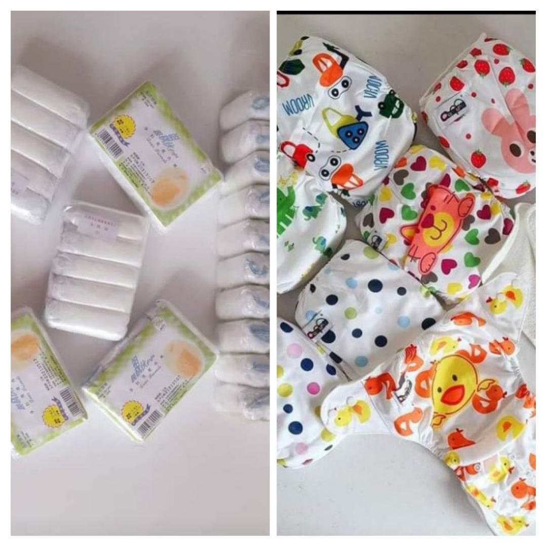 1 Heavy baby Rompers + 3 light baby rompers different colours+  2 sets washable baby Diapers (3 nappies in a set)+ 3 disposable pants sets( 5 pant pieces in a set)
