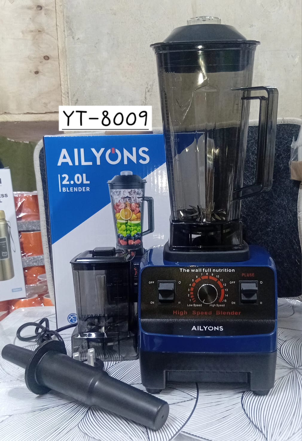 Ailyons YT-8009 2.0L Commercial Blender, a multifunctional kitchen appliance.
Capacity: 2.0-liter blending jug. 
Functionality: 2-in-1 design includes a blender and a grinding mill attachment. 
Perfor
