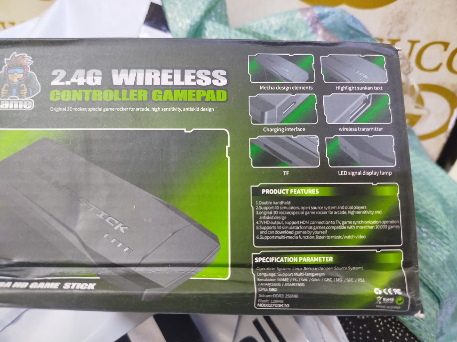 2.4G Wireless Controller Gamepad, which is part of a retro game console system often referred to as a "Game Stick Lite" or "Funtell Wireless Retro Game Console". 
Key features of this product include: