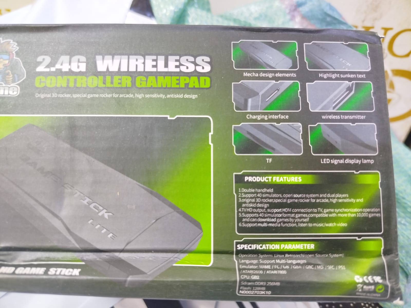 2.4G Wireless Controller Gamepad, which is part of a retro game console system often referred to as a "Game Stick Lite" or "Funtell Wireless Retro Game Console". 
Key features of this product include: