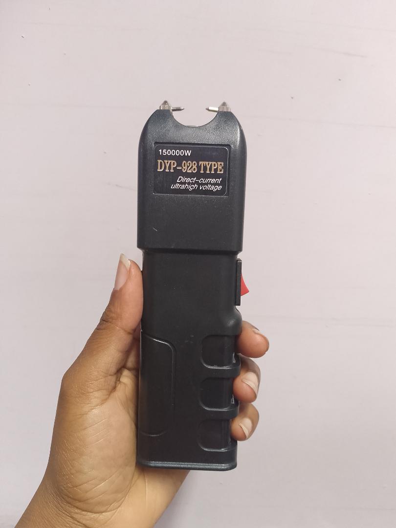 928 electric shock self defense torch with dimming light super high DC pulse