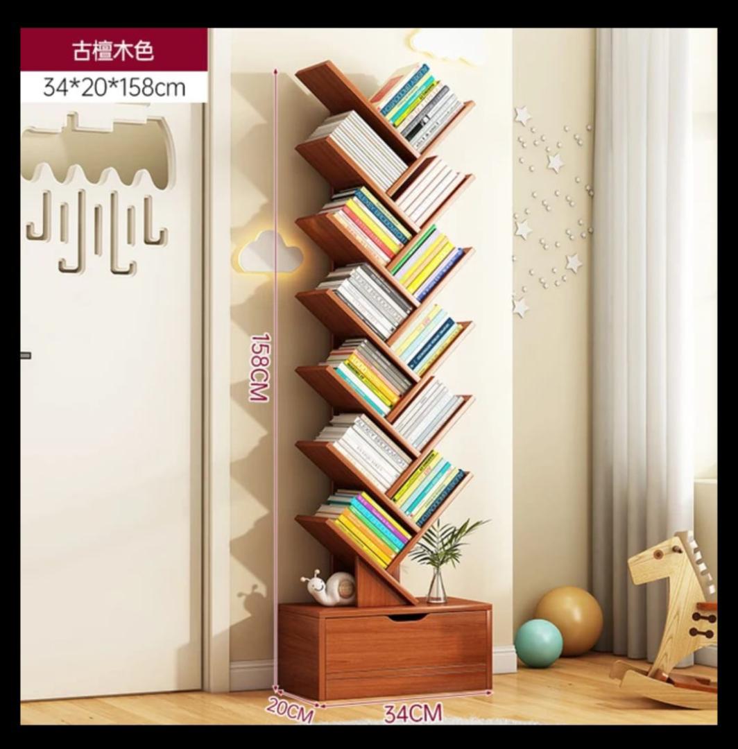 *💢 Tree Bookshelf*
 ◾Has a lower drawercase
◾ Color : Dark brown& white
◾It's made of bamboo
 Can be used as a bookshelf, for decor, display