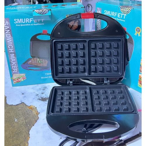 🧇💙 Breakfast Just Got Cuter! 💙🧇 Meet the SMURFETT 2-Slot Waffle Maker — your new kitchen BFF! 🔹 Makes 2 perfectly golden waffles at once 🔹 Non-stick plates for easy cleanup 🔹 Compact, cute