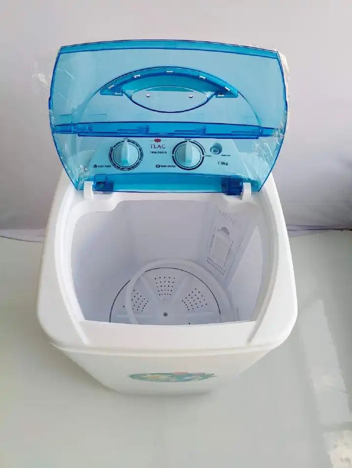 Mini washing machine with a shoe brush