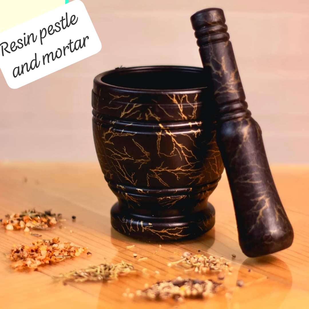 Black marble design pestle and mortar, spice grinder, herbs grinder, ginger and turmeric grinder. Kitchen spice grinder