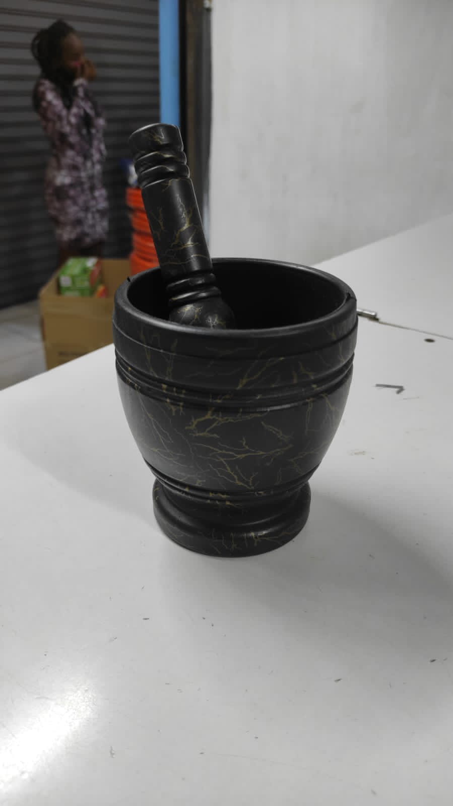 Black marble design pestle and mortar, spice grinder, herbs grinder, ginger and turmeric grinder. Kitchen spice grinder