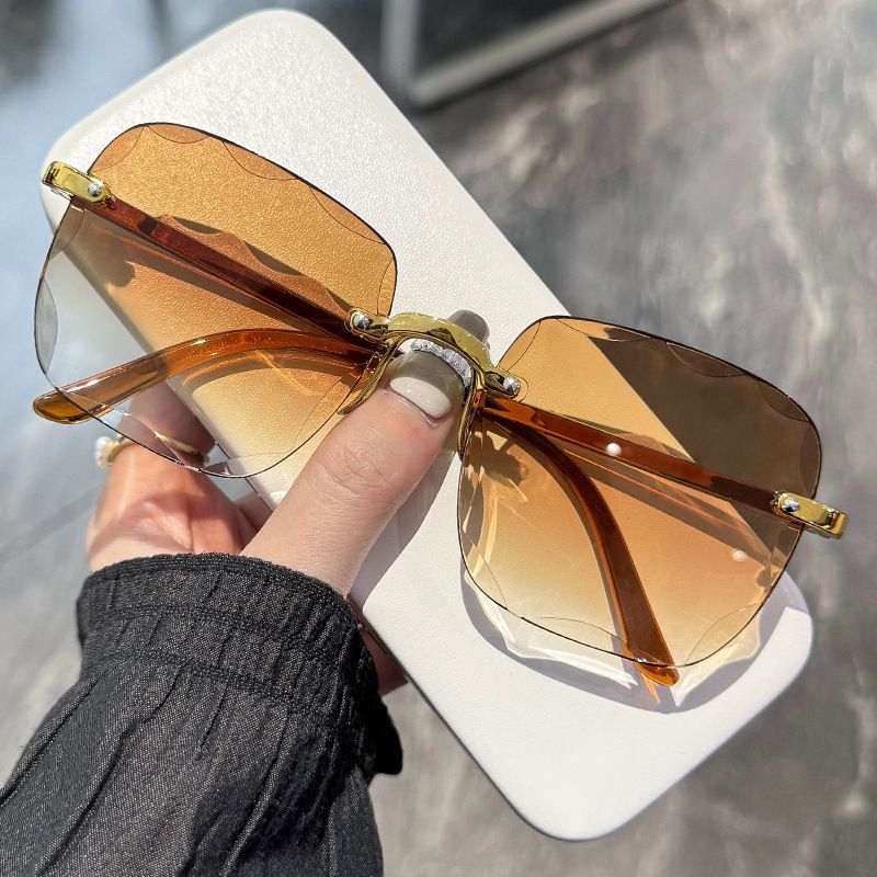 Rimless cut edge sunglasses Internet celebrity trend sunglasses women's fashion i korean version UV protection too
Male glasses