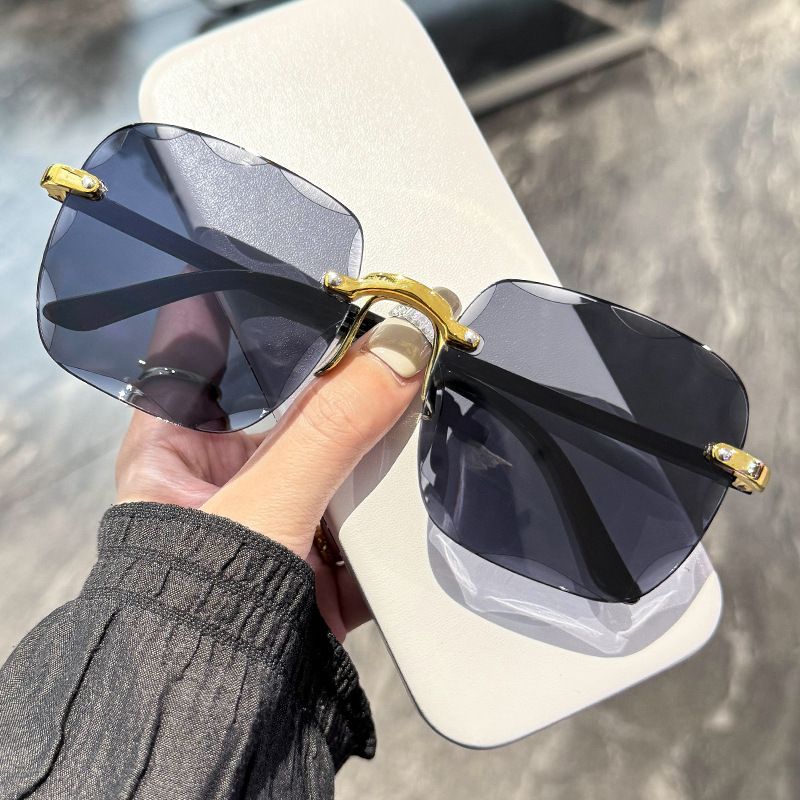 Rimless cut edge sunglasses Internet celebrity trend sunglasses women's fashion i korean version UV protection too
Male glasses